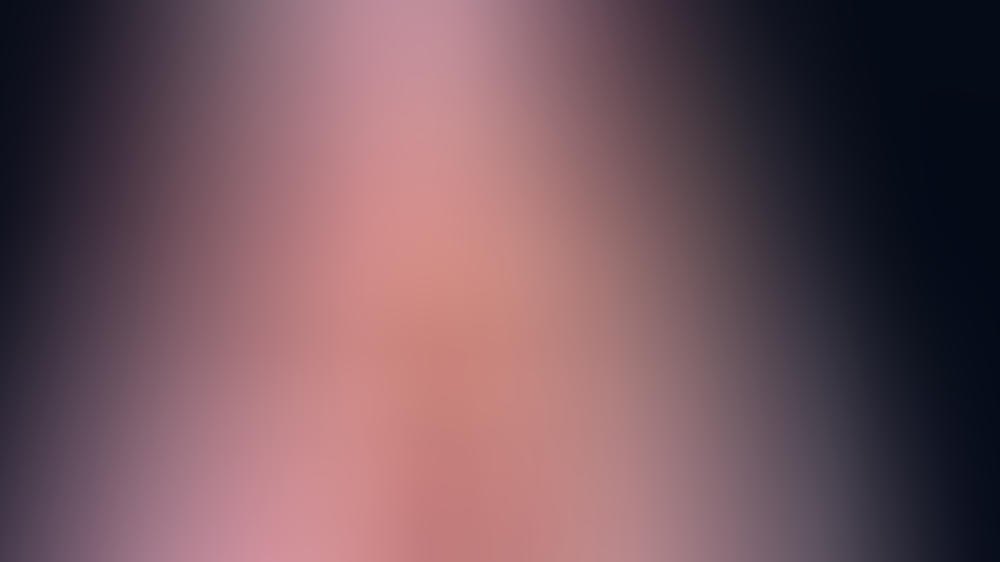 Macklemore mit rosa Perücke Macklemore mit rosa Perücke