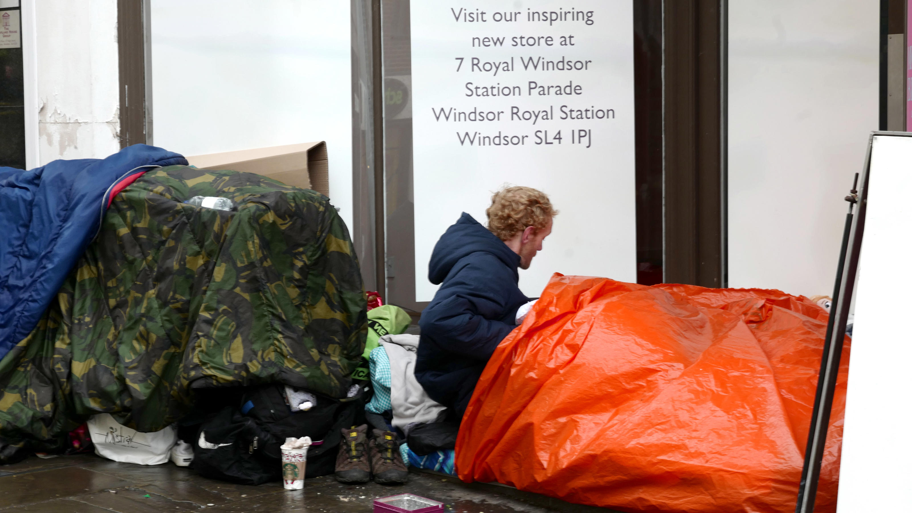 Homeless people are seen on the streets of Windsor in England after a council leader called for action to tackle