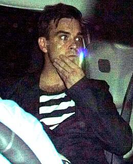 Robbie Williams Paparazzi Unfall