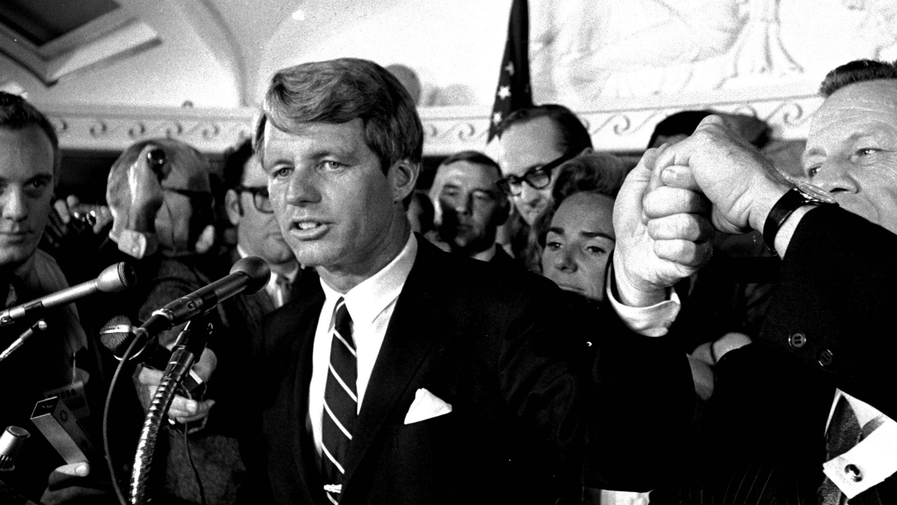 Sen. Robert F. Kennedy addresses a throng of supporters in the Ambassador Hotel in Los Angeles early in the morning of June 5, 1968, following his victory in the previous day's California primary election.  A moment later he turned into a hotel kitch