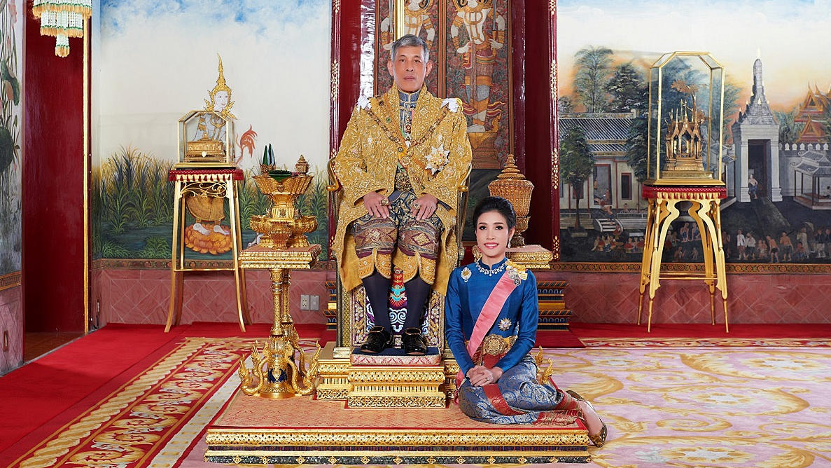 Thailand's King Maha Vajiralongkorn and General Sineenat Wongvajirapakdi, the royal noble consort pose at the Grand Palace in Bangkok, Thailand, in this undated handout photo obtained by Reuters August 27, 2019. Royal Household Bureau/Handout via REU