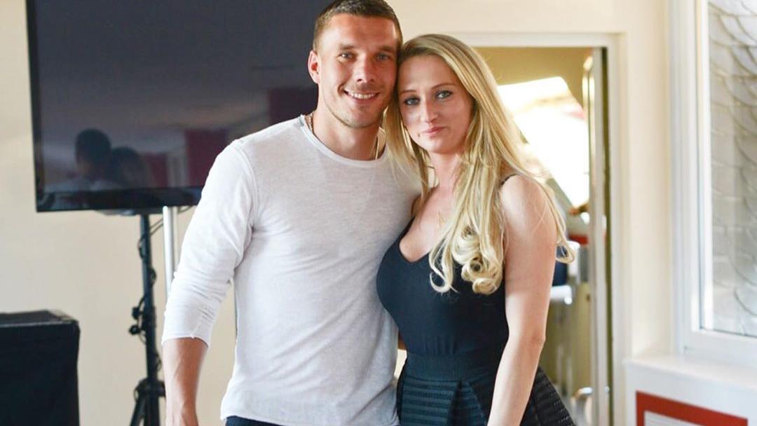 Lukas Podolski und seine Ehefrau Monika