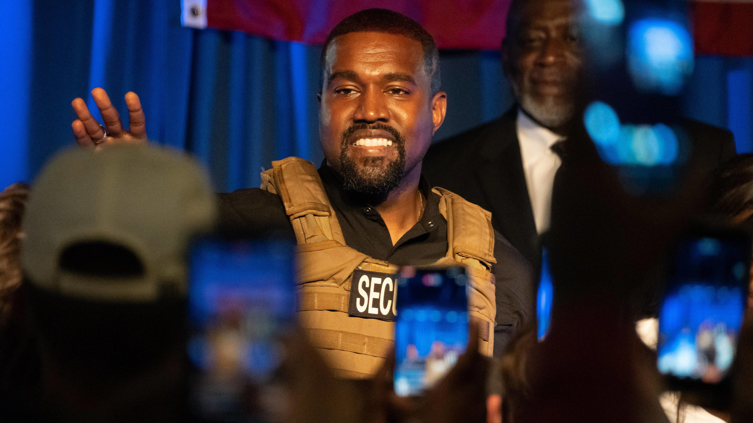  American rapper and entrepreneur Kanye West, wearing a bulletproof vest, addresses supporters during his first campaign event in the upcoming presidential election, Sunday, July 19 2020, in North Charleston, South Carolina. Kanye told the crowd that