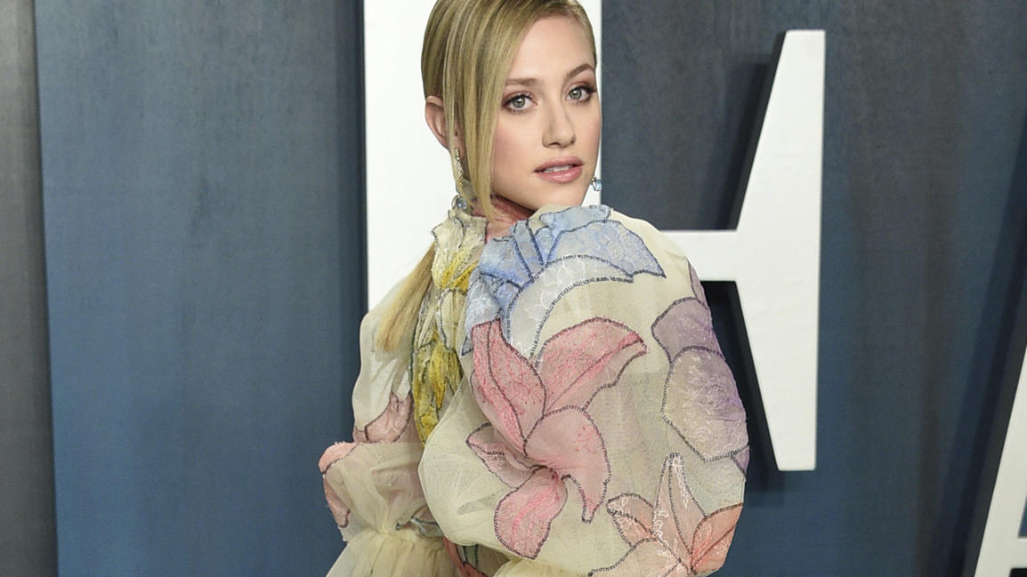 FILE - Lili Reinhart arrives at the Vanity Fair Oscar Party on Feb. 9, 2020, in Beverly Hills, Calif. Reinhart turns 24 on Sept. 13. (Photo by Evan Agostini/Invision/AP, File)
