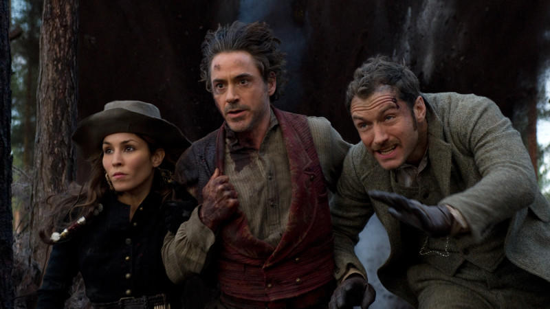 Noomi Rapace, Robert Downey Jr. und Jude Law in 'Sherlock Holmes - Spiel im Schatten'
