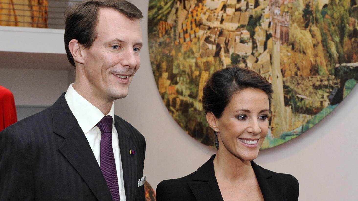 epa02990592 Danish Prince Joachim (L) and his wife Princess Marie (R) smile as they visit the Wild Swans Exhibition in Tokyo, Japan, 03 November 2011. The exhibition presents artworks by Queen Margrethe II based on the fairytale written in 1838 by Da