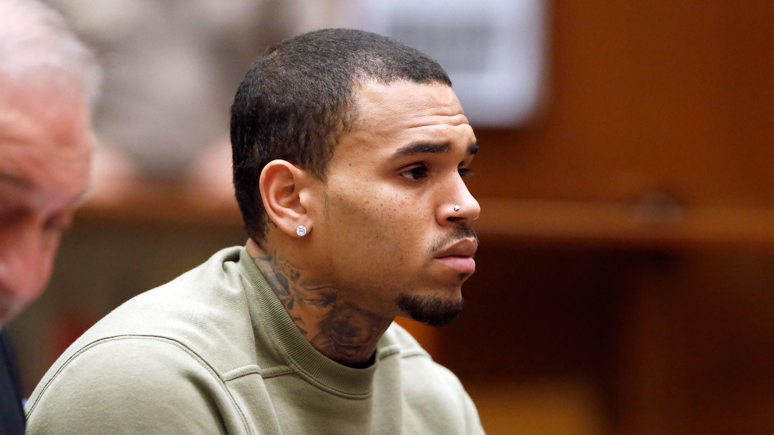 LOS ANGELES, CA - JANUARY 15:  Singer Chris Brown attends a progress hearing at Los Angeles Superior Court on January 15, 2015 in Los Angeles, California.  Brown was first placed on probation after the 2009 domestic violence case in which he plead gu