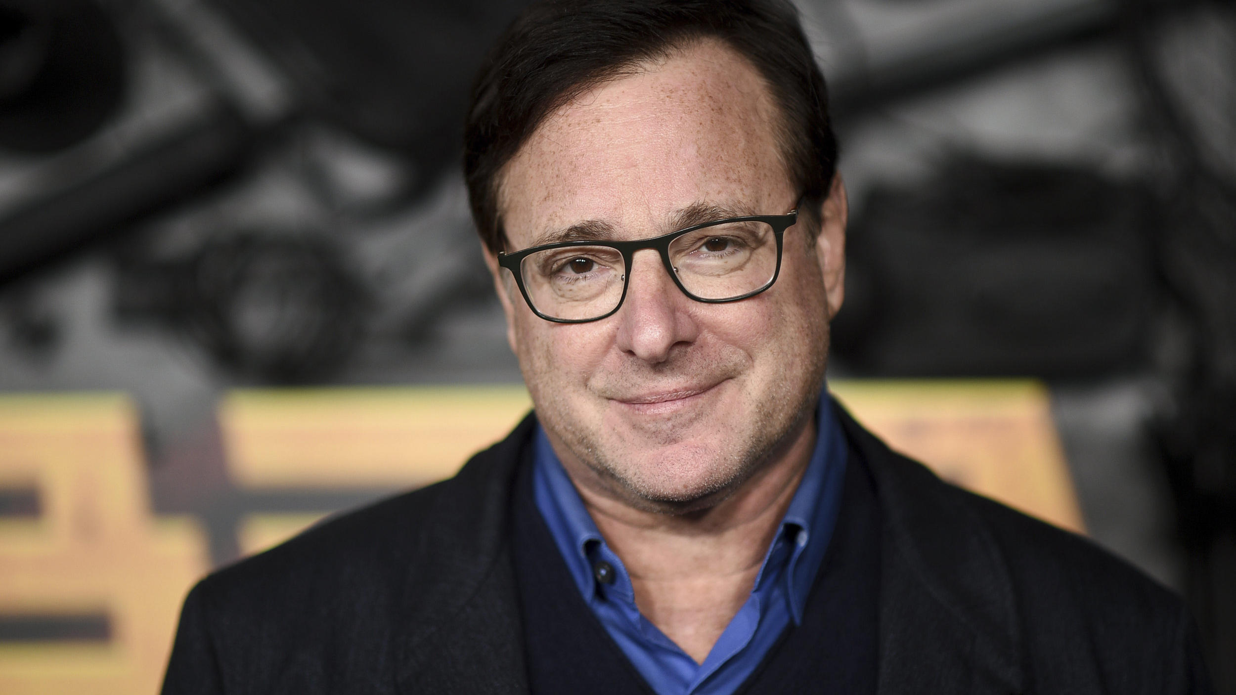 FILE - Bob Saget arrives at a screening of "MacGruber" on Dec. 8, 2021, in Los Angeles. Saget's family has released a statement on the cause of his death last month in Florida, citing authorities saying the actor-comedian died from an accidental blow