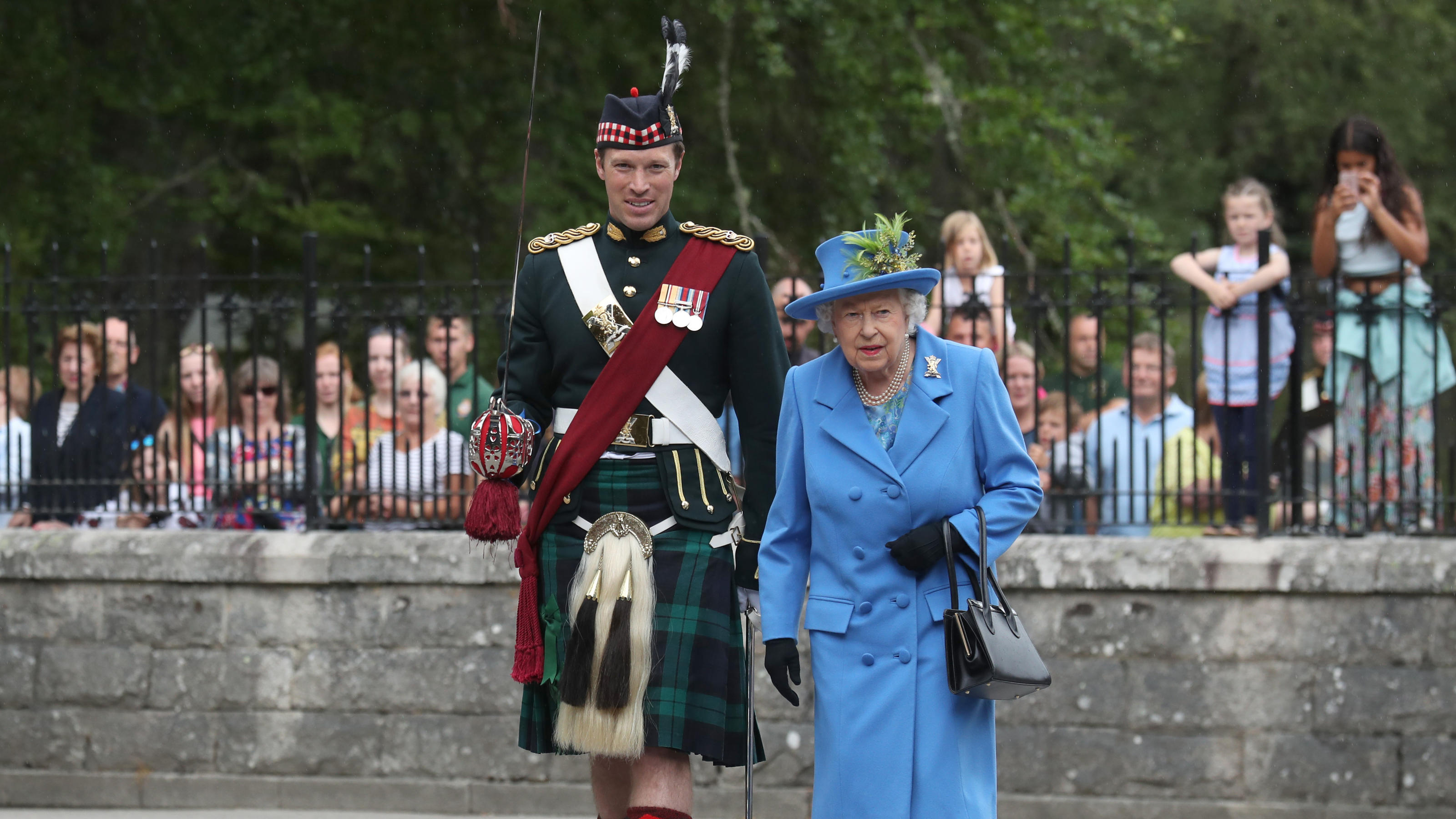 Queen Elizabeth II, with Officer Commanding Major Johnny Thompson, inspects Balaclava Company, 5 Battalion The Royal Regiment of Scotland at the gates at Balmoral, as she takes up summer residence at the castle.