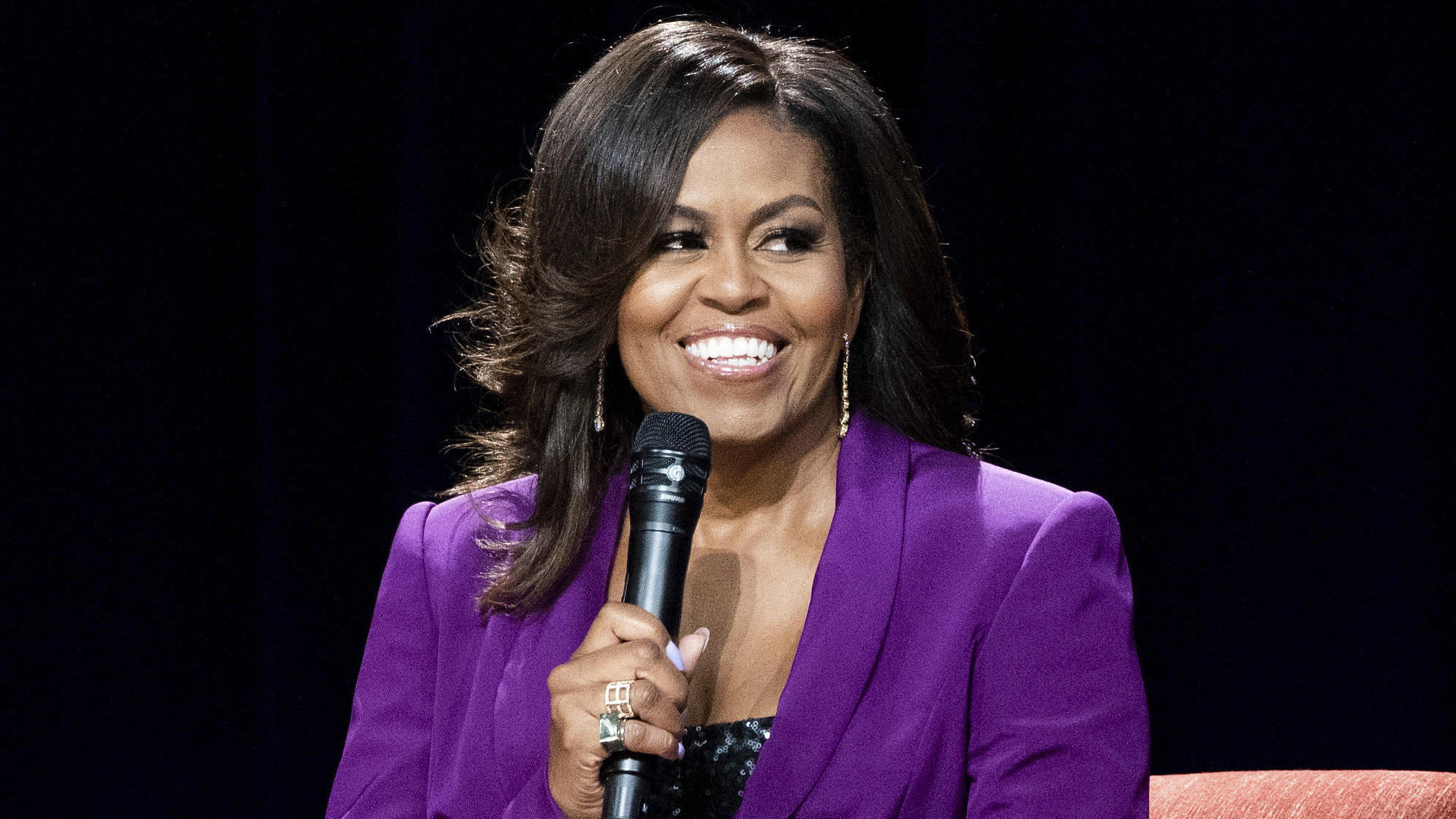 ARCHIV - 12.05.2019, USA, Atlanta: Die ehemalige First Lady Michelle Obama lächelt bei einem Auftritt. Michelle Obama wird in die «National Women's Hall of Fame» aufgenommen. Foto: Paul R. Giunta/AP/dpa +++ dpa-Bildfunk +++
