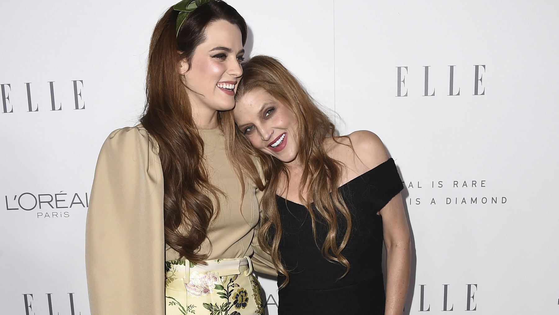 FILE - Riley Keough, left, and her mother Lisa Marie Presley arrive at the 24th annual ELLE Women in Hollywood Awards on Oct. 16, 2017, in Los Angeles. Presley, singer and only child of Elvis, died Thursday, Jan. 12, 2023, after a hospitalization, ac