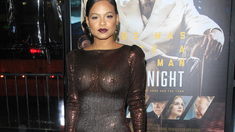 Christina Milian wears a very see through dress without underwear at the premiere of 'Live by Night' in Hollywood, CA. The flashes of the photographers even expose the spanx she wears underneath.