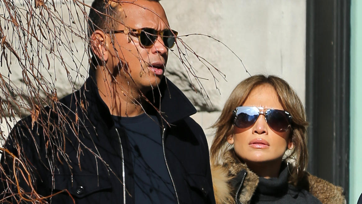 Actress Jennifer Lopez and her boyfriend Alex Rodriguez leave Balmain holding hands in Soho in New York City, NY. Jennifer and Alex are accompanied by her mom, Guadalupe Rodriguez.